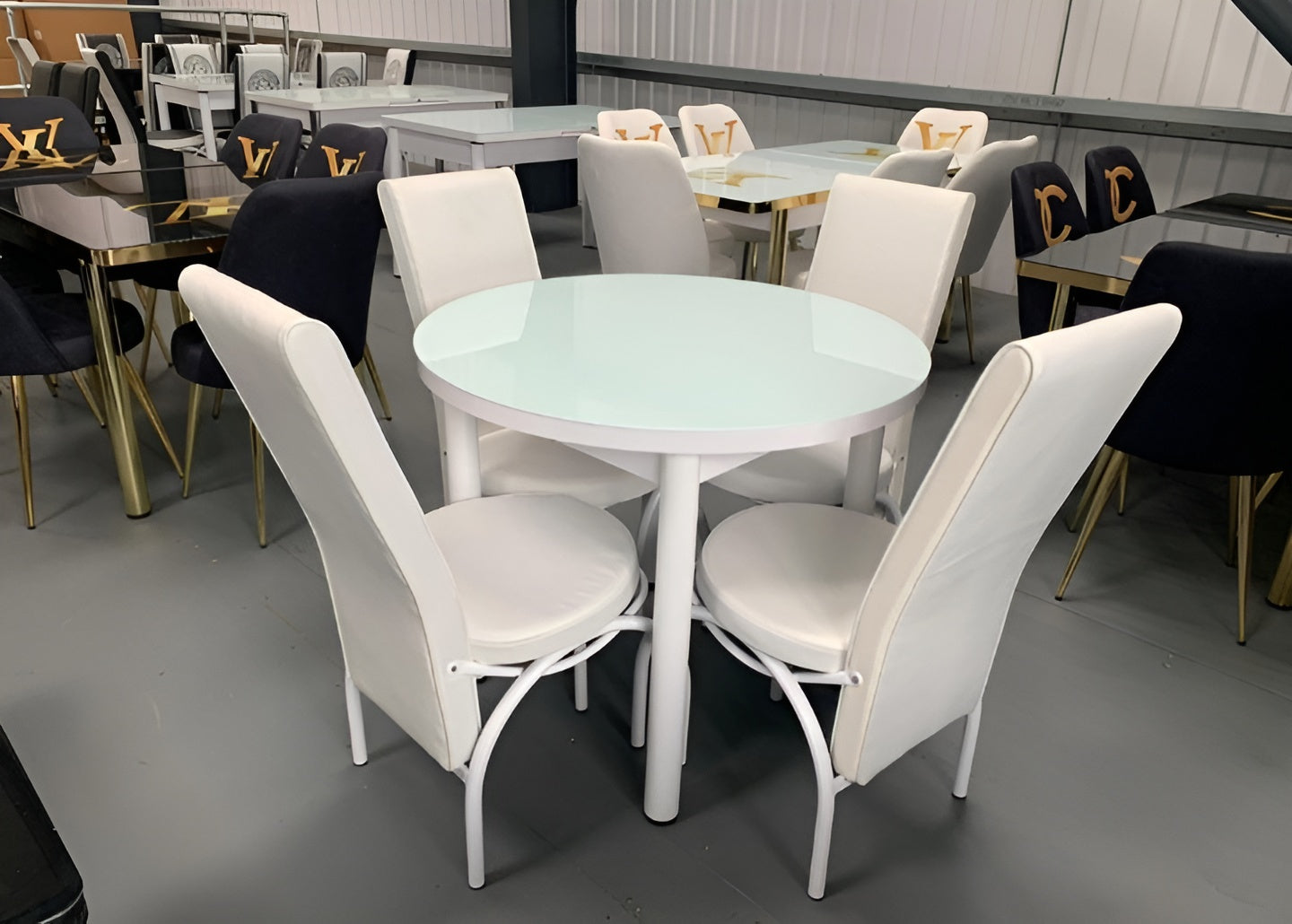 Round Glass And Steel Dining Table With 4 Faux Leather Chairs
